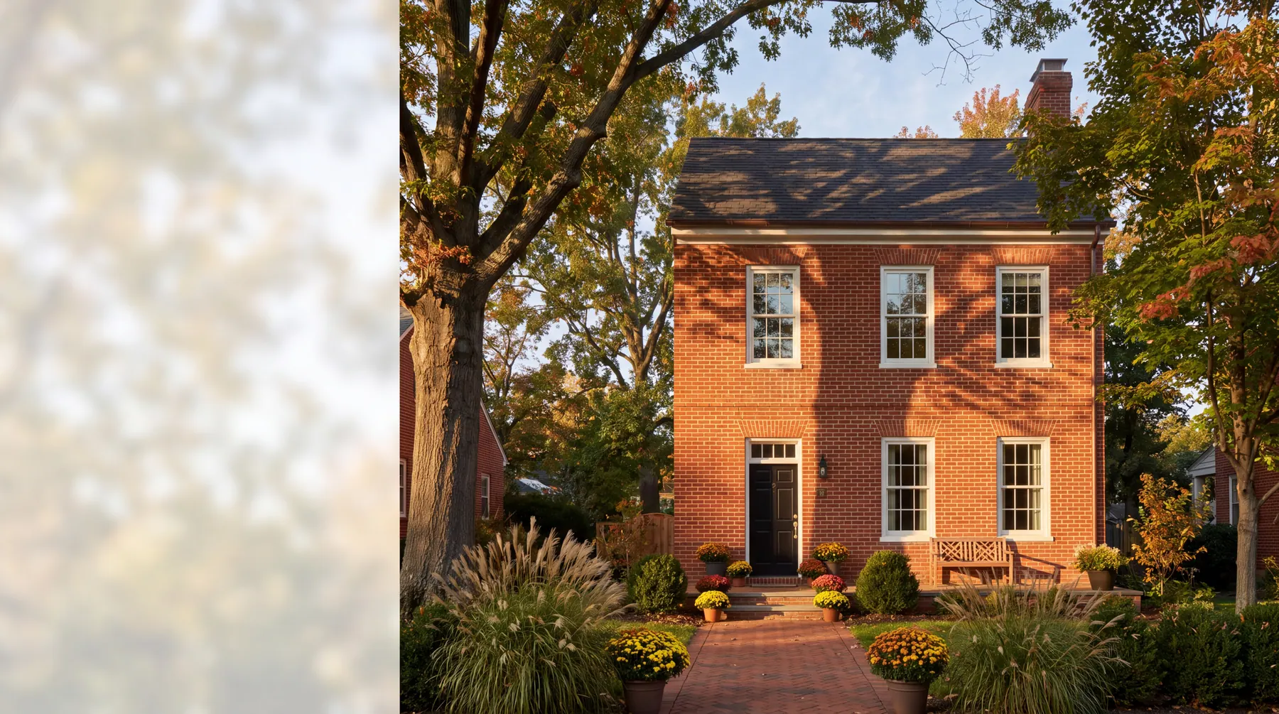 A brick Maryland home framed by mature trees